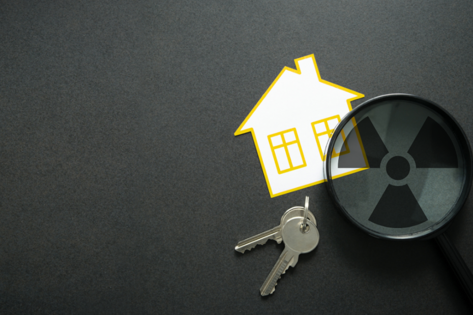 An image showing a home, a set of keys, and a magnifying glass with a radon symbol inside of it.