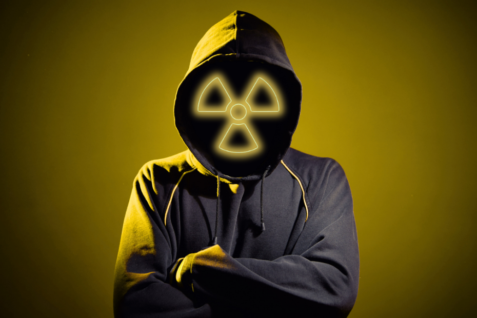 An image showing a faceless scammer with a radioactive symbol in place of his face.